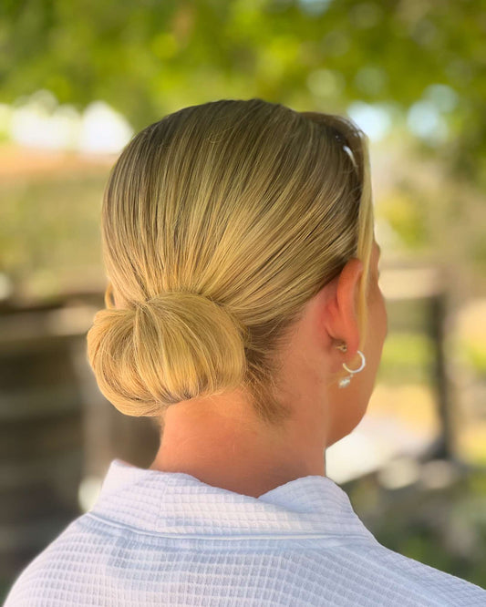 Low tight bun - Hair by Natasha